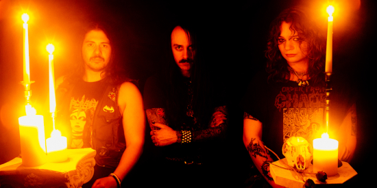 Band photo of the three members of Goetia