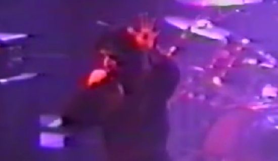 Screen cap of the singer of Killing Joke performing at the Astoria in 1991